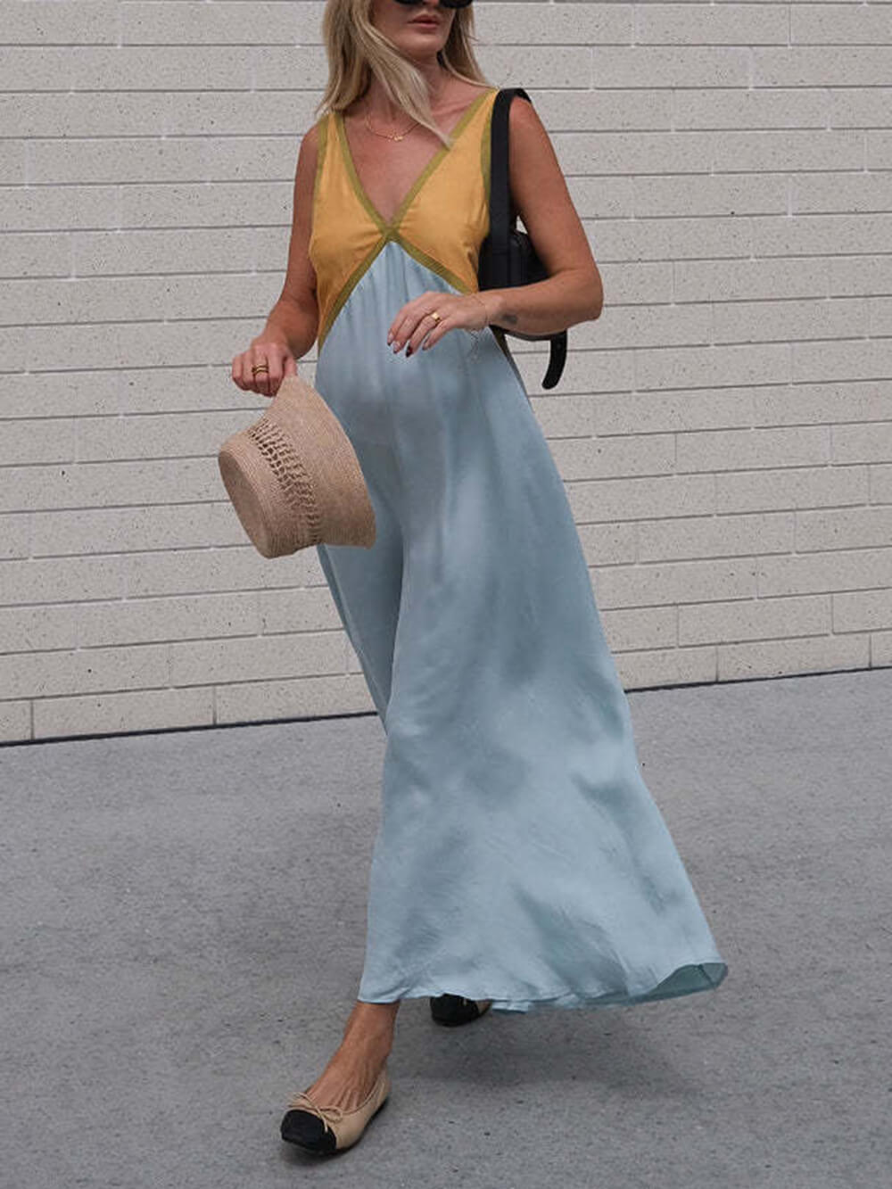 Vestido elegante con escote en V y colores contrastantes