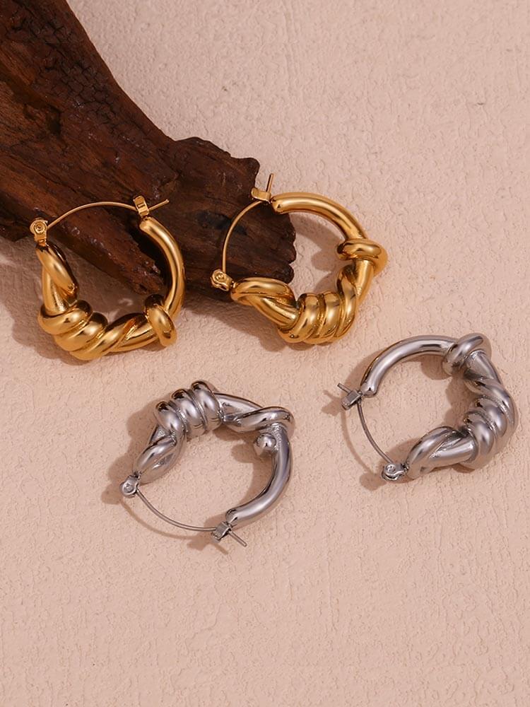 Boucles d'oreilles rondes classiques enveloppées