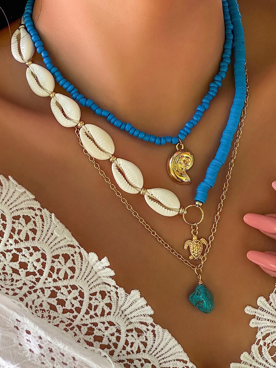 Collier bohème multicouche en perles et coquillages tournesol