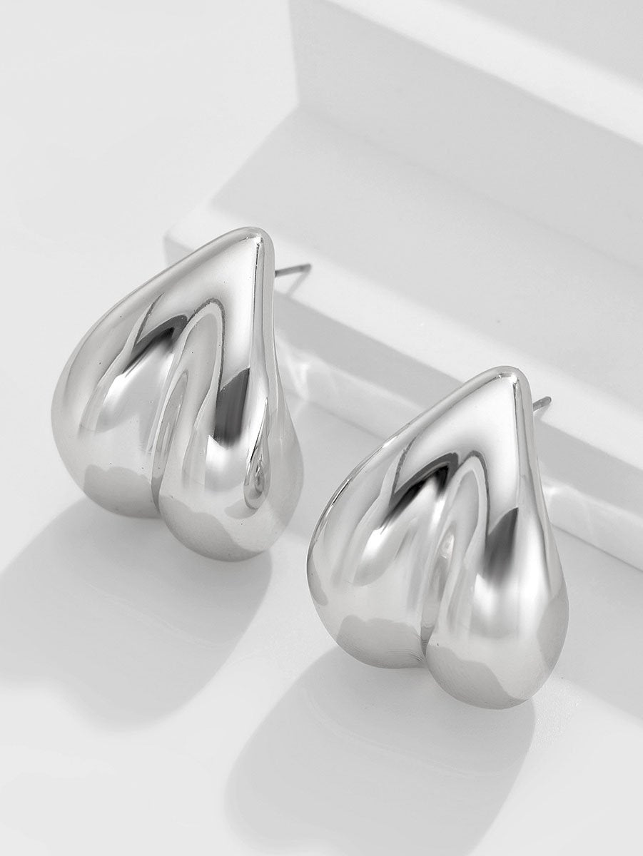 Boucles d'oreilles géométriques incurvées en forme de cœur à la mode