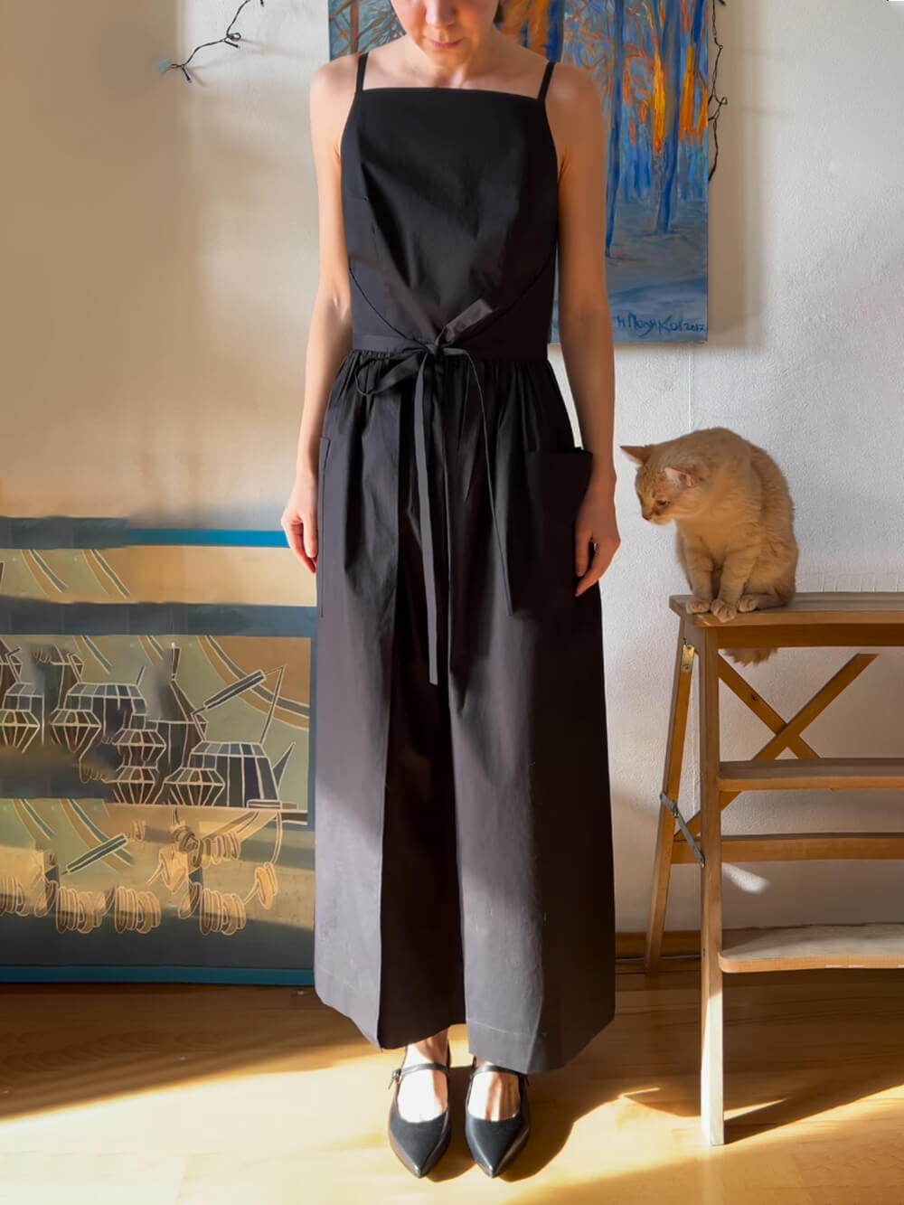 Robe gilet unique à poches et lacets fendus sur le côté