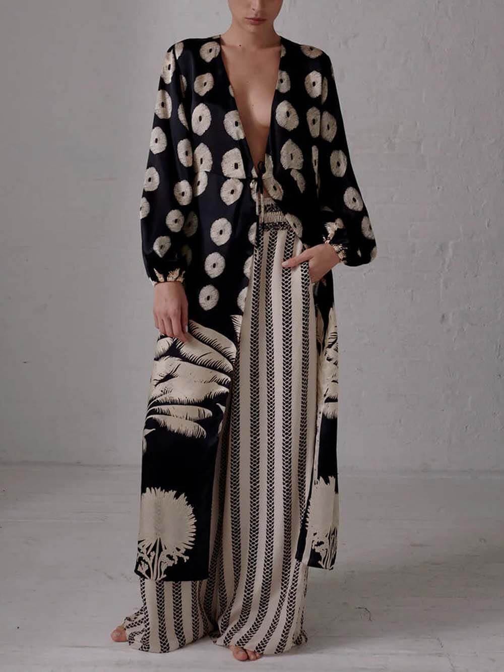 Pantalones anchos con bolsillo y cintura plisada y estampado de serpiente únicos