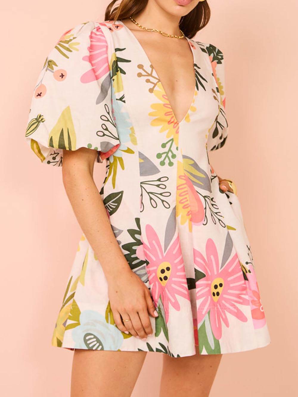 Mini-robe à poches et manches bouffantes à imprimé floral