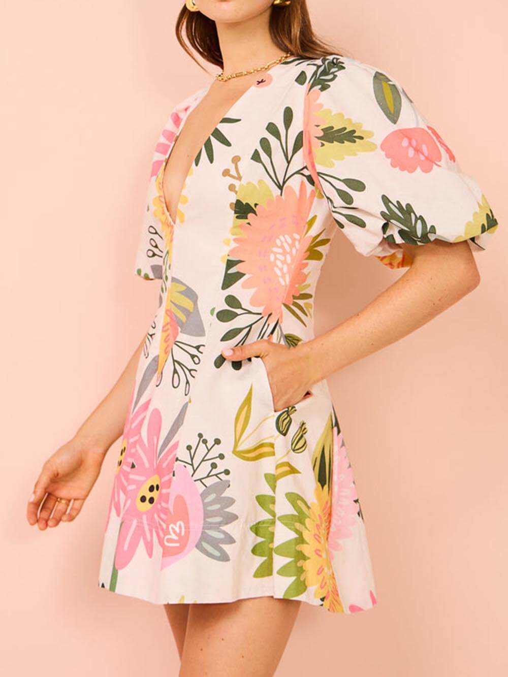 Mini-robe à poches et manches bouffantes à imprimé floral