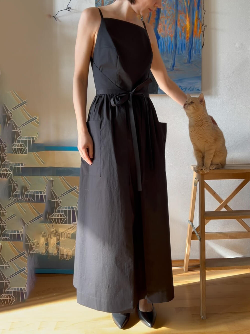 Robe gilet unique à poches et lacets fendus sur le côté