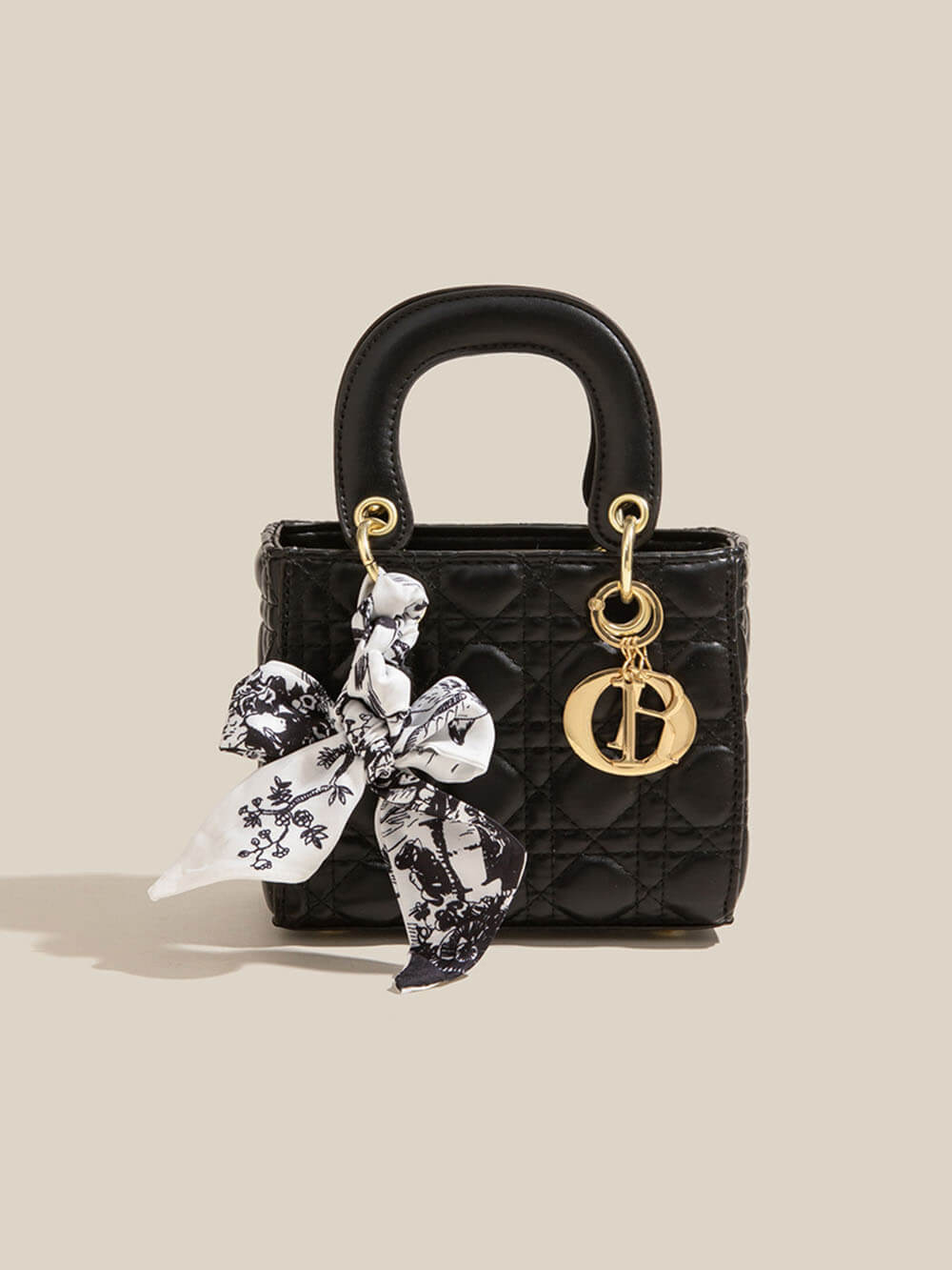 Bolsos cruzados de mano con pañuelo de seda de diamantes