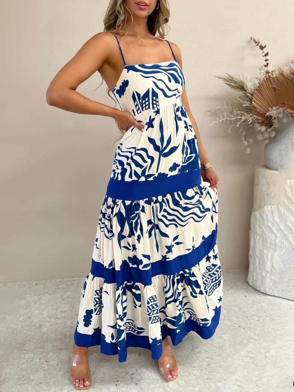 Robe longue élégante à volants et imprimé floral