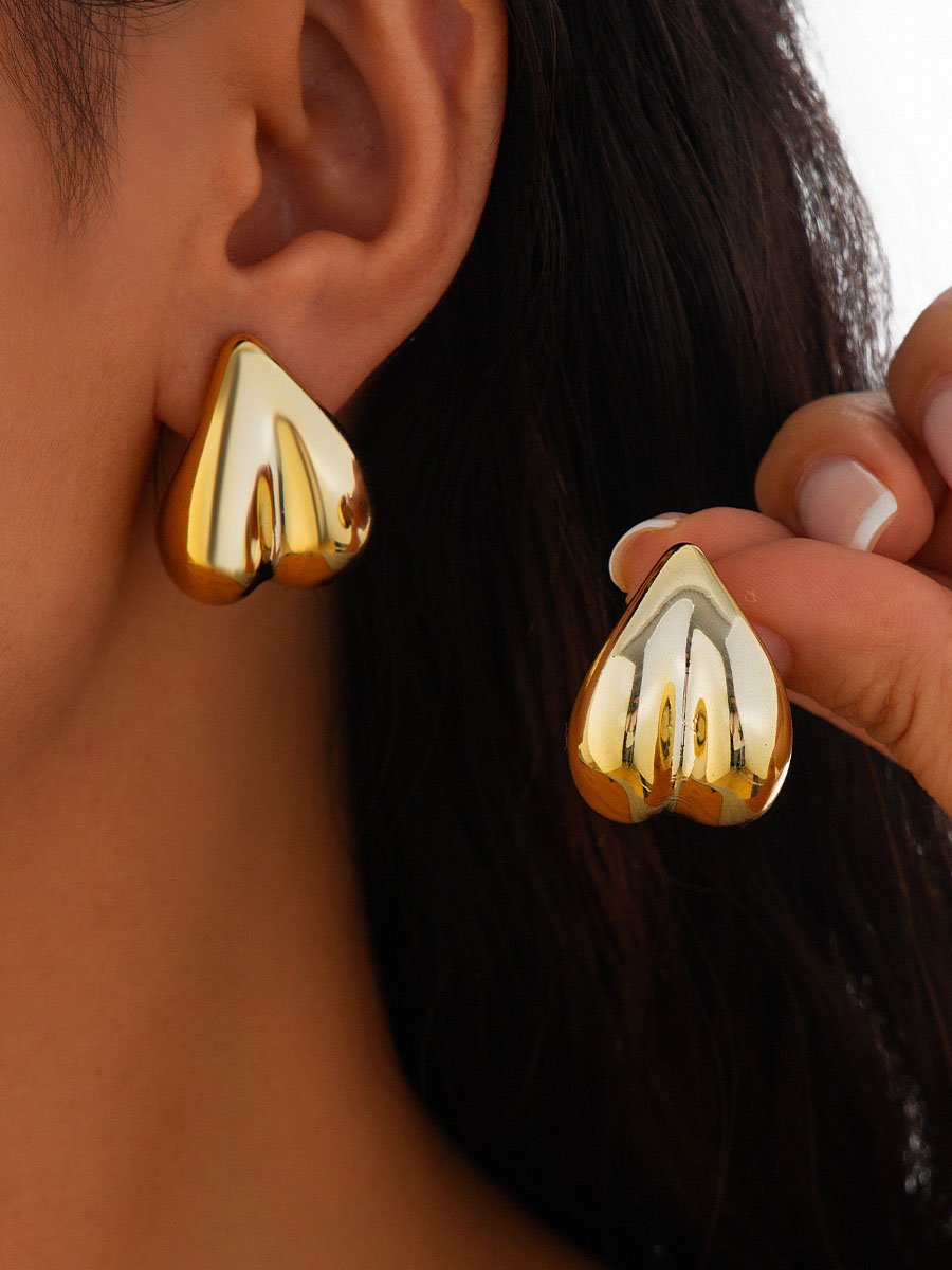 Boucles d'oreilles géométriques incurvées en forme de cœur à la mode