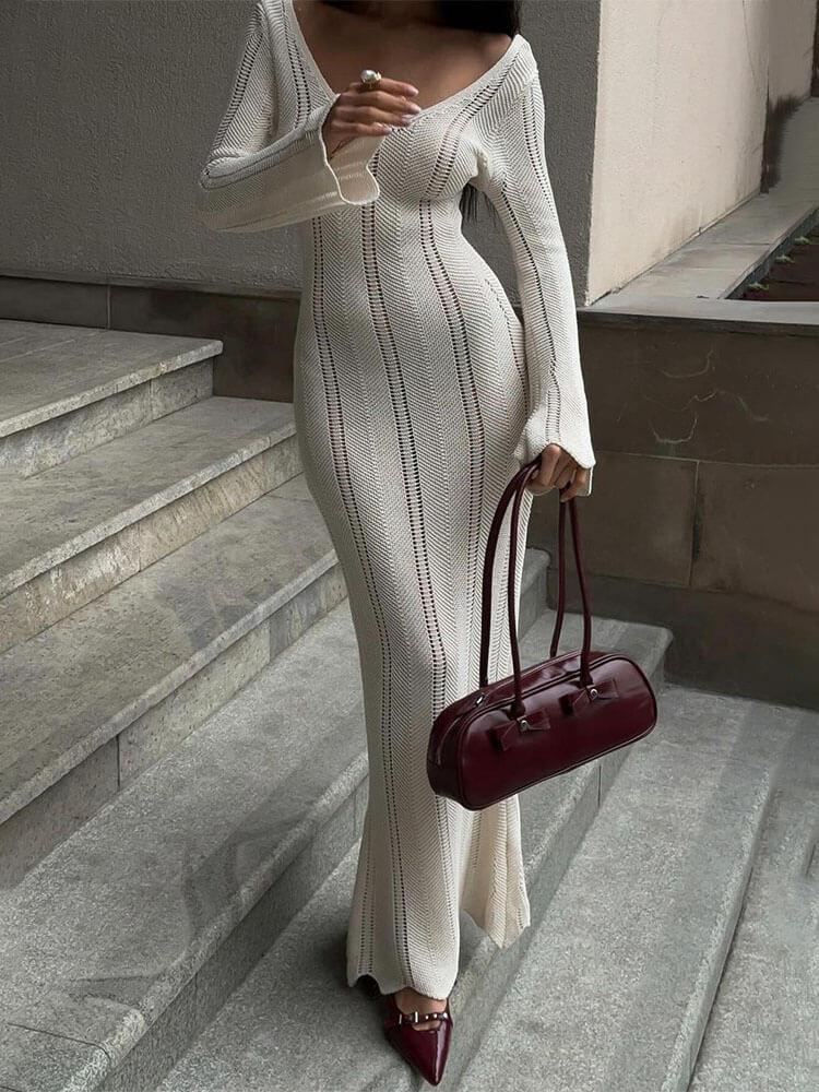 Robe longue de vacances en tricot de couleur unie ajourée
